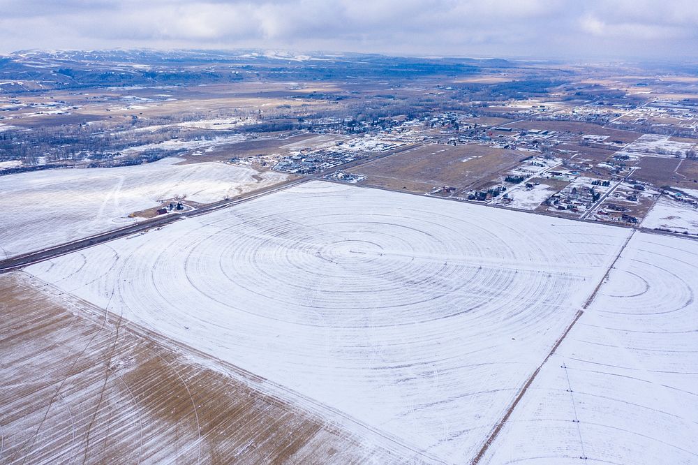 An aerial photo of a field irrigated by the Gallatin River watershed. Bozeman, MT. March, 2020. Bozeman, Gallatin County…