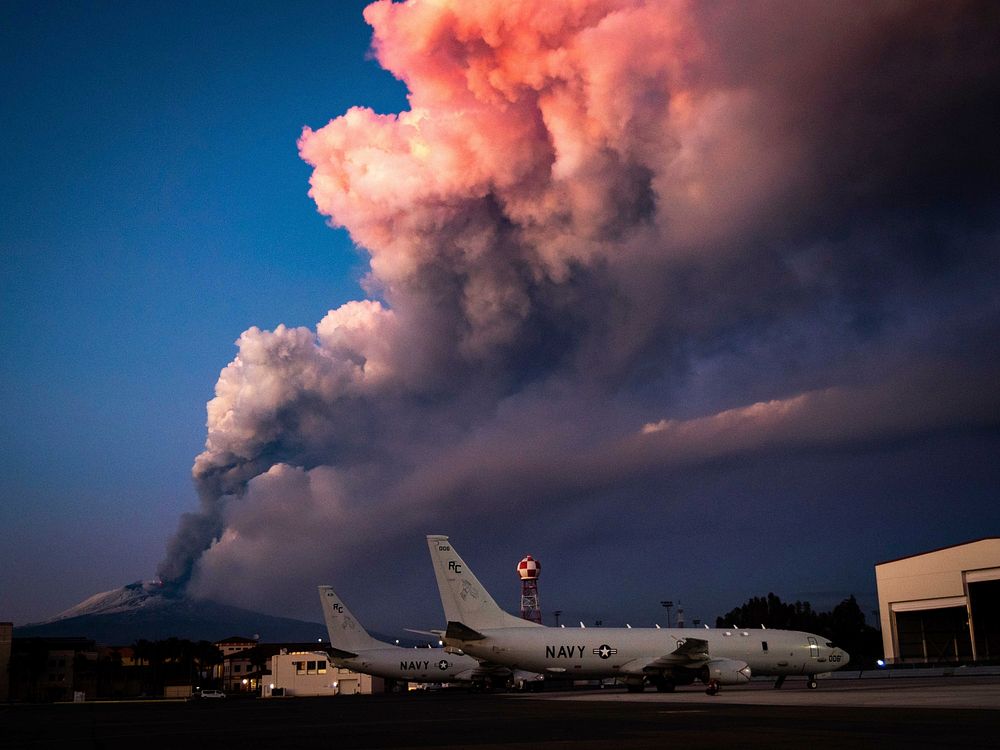 NAVAL AIR STATION SIGONELLA, Italy (Feb. 16, 2021) Mt. Etna lets off some steam in the background of P-8A Poseidon maritime…