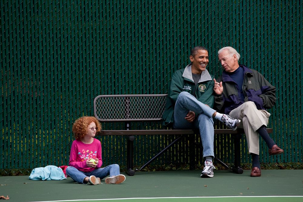 President Barack Obama, Vice President Joe Biden and Claire Duncan, daughter of Education Secretary Arne Duncan, watch a…