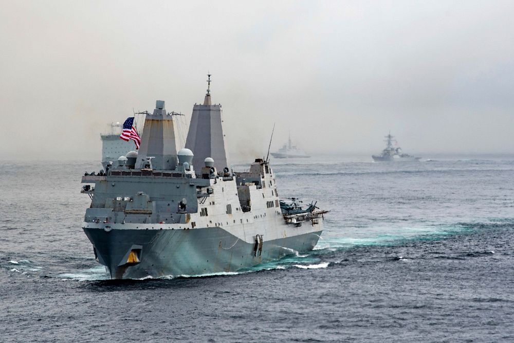 ATLANTIC OCEAN (May 17, 2021) The amphibious transport dock ship USS San Antonio (LPD 17) transits in formation with ships…