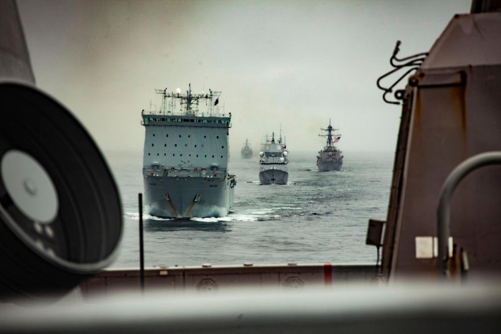 Atlantic Ocean (May 17, 2021) The Iwo Jima Amphibious Ready Group and HMS Queen Elizabeth Carrier Strike Group maneuver in a…