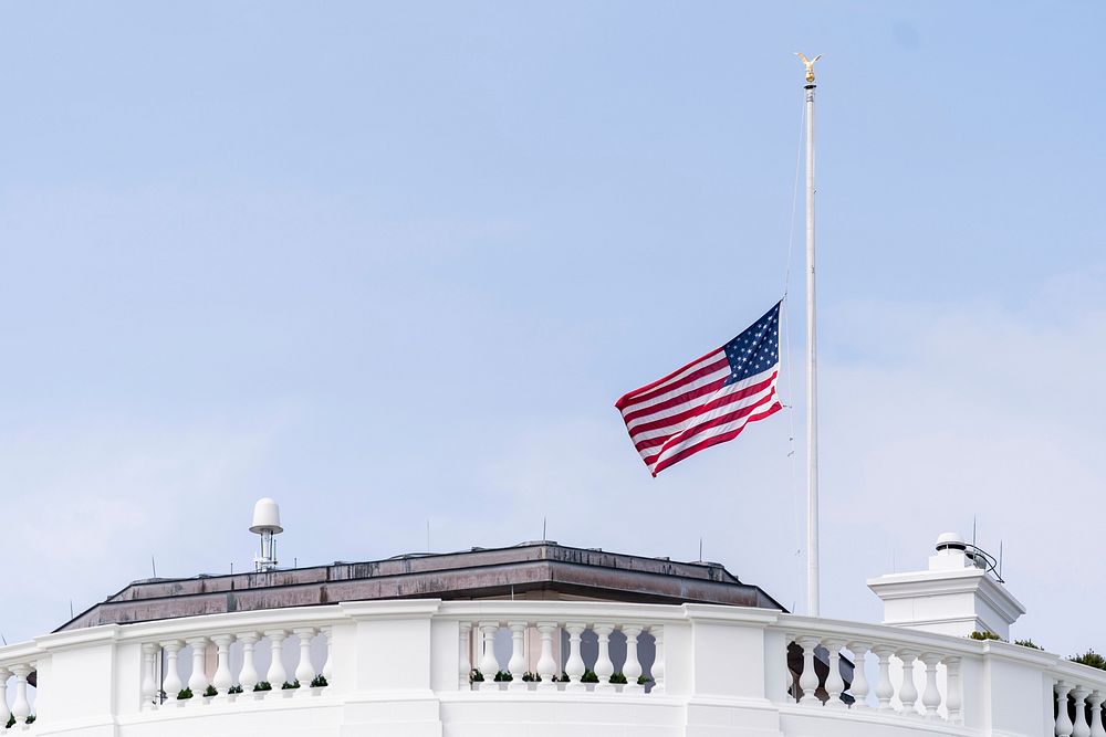 The U.S. flag flies at half-staff above the White House Tuesday, March 23, 2021, in memory of the victims of Monday’s mass…