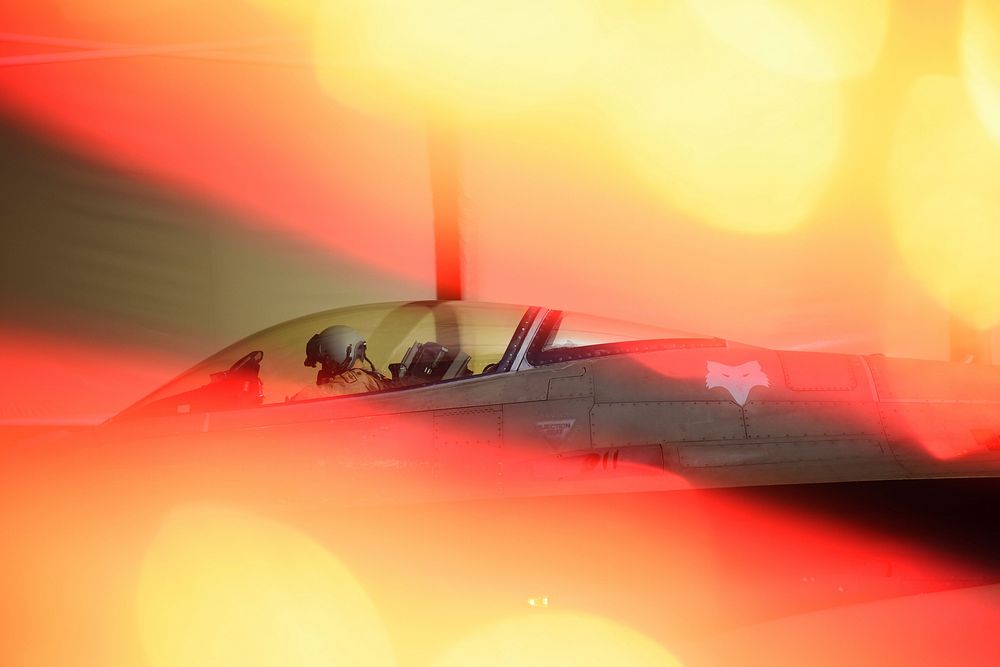 Expeditionary Fighter Squadron pilot prepares for a mission aboard an F-16 Fighting Falcon fighter jet at Prince Sultan Air…