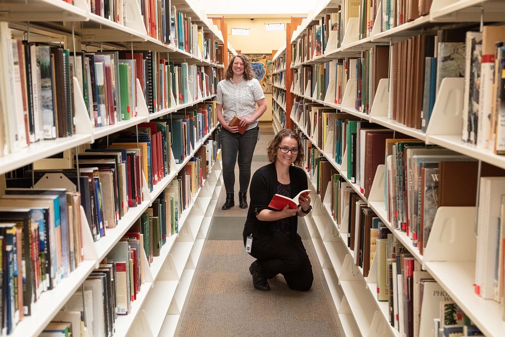 Mel Cutietta and Sarah Marino, research librarians, Heritage and Research Center by Jacob W. Frank. Original public domain…