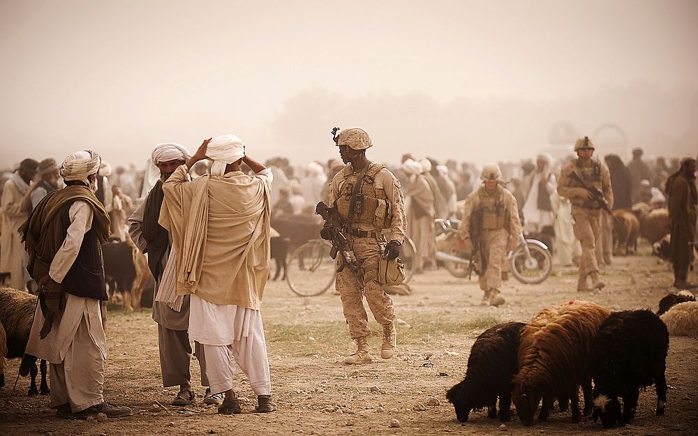 Marines escort media through Helmand province