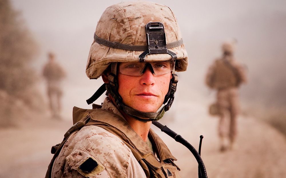 A Marine looks back during a patrol to check on the rest of the Marines