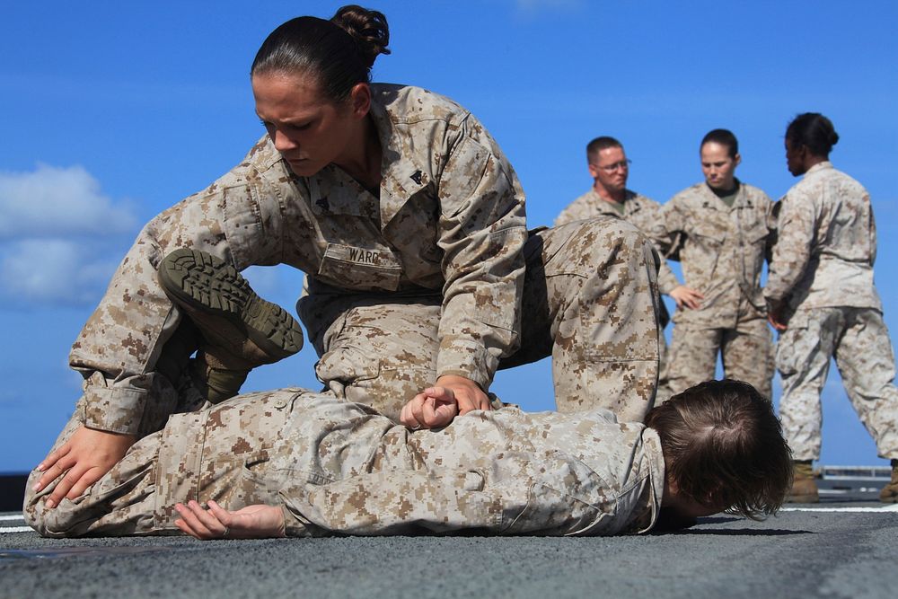 Female Marines Demonstrate Take Down and Restraint