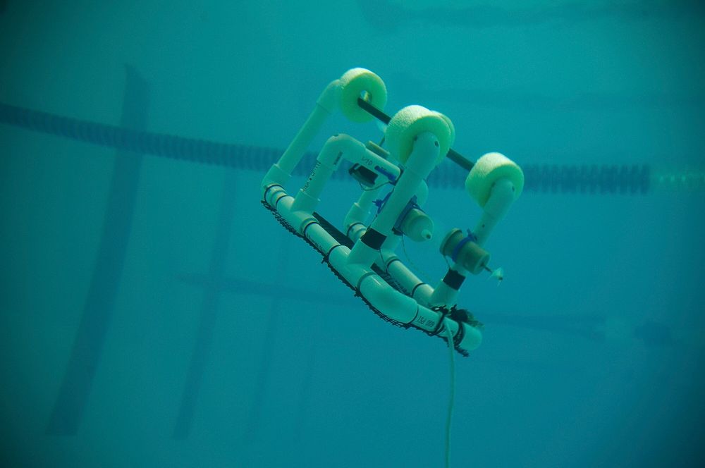 NEW LONDON, Conn. - An underwater remotely operated vehicle surfaces during an experiment at the Roland Hall pool at the…