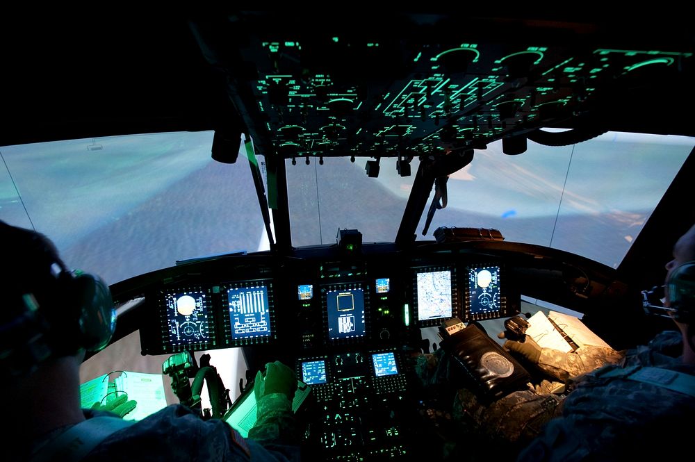 Pilot on Chinook training simulator. Original public domain image from Flickr
