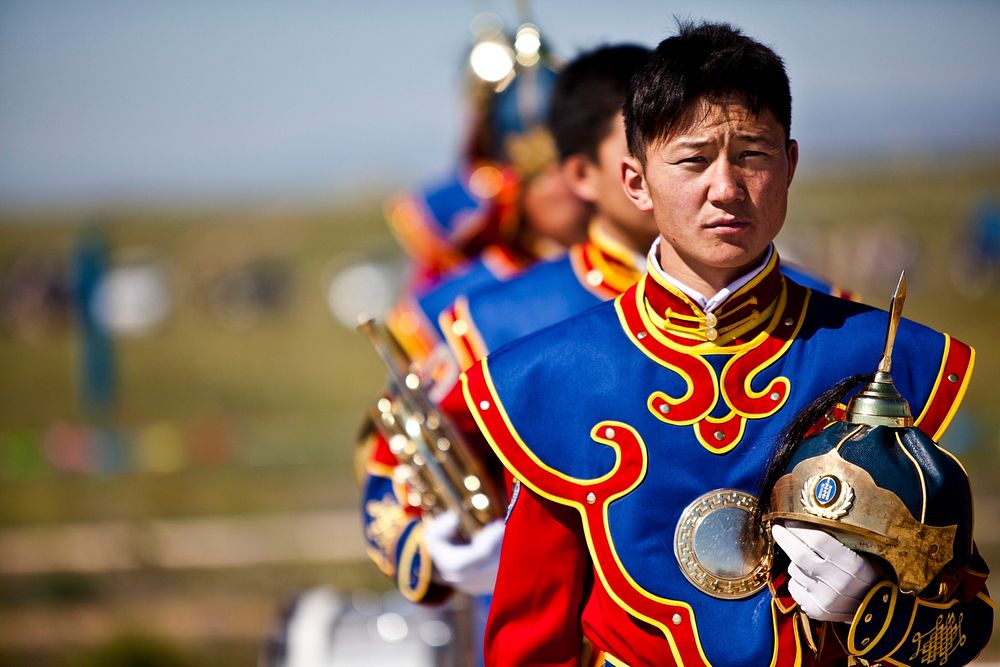 Mongolian state honor guard members stand in formation during the opening ceremony of exercise Khaan Quest 2011 near…