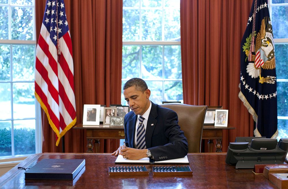 President Barack Obama signs the Budget Control Act of 2011 in the Oval Office, Aug. 2, 2011.