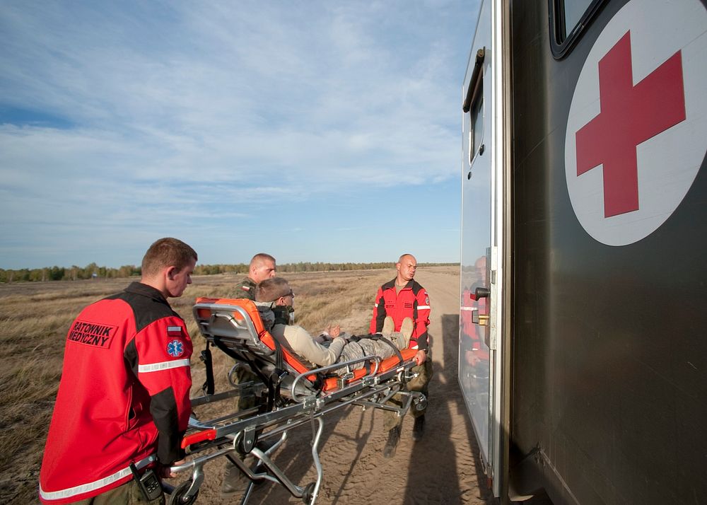 AmbulancePolish military medics transport Private Patrick Morgan, (center), assigned to US Army Europe's 173rd Airborne…