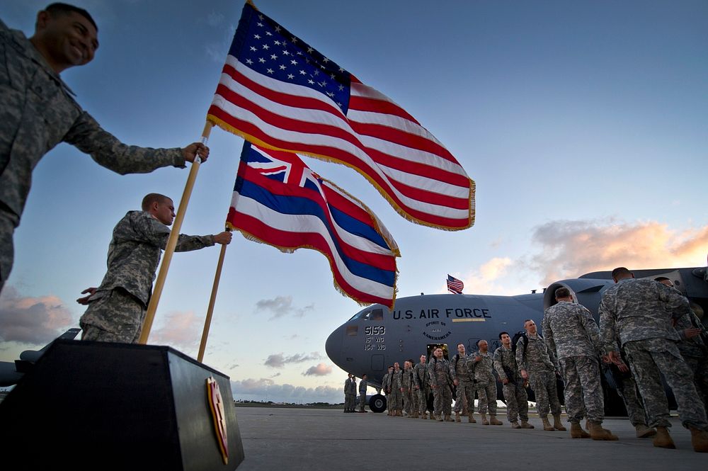 U.S. Soldiers hold American and Hawaiian flags while Army Lt. Gen. Francis Wiercinski, the U.S. Army Pacific commander, and…