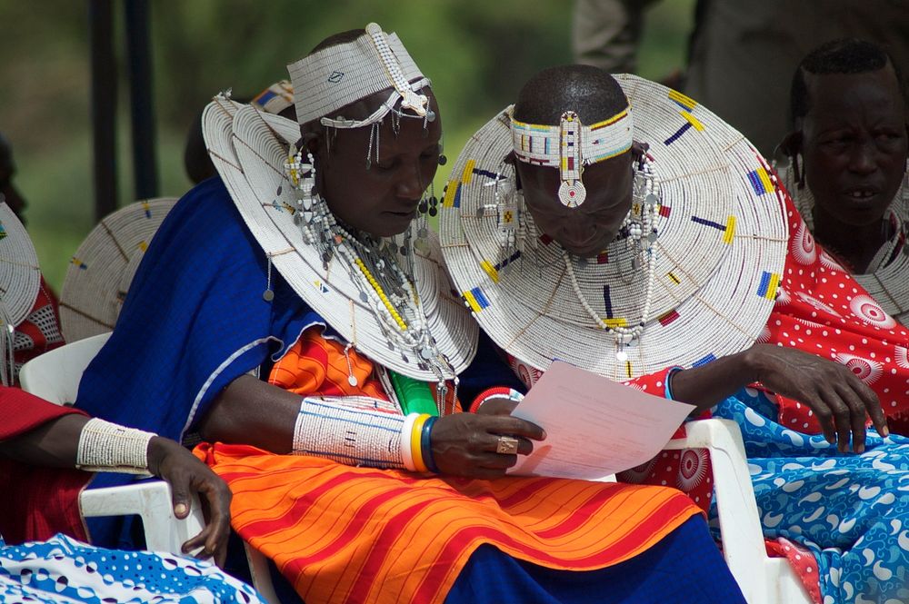 Maasai women at USAID literacy event. In Tanzania, USAID's Empowerment through Literacy Education Access Project (E-LEAP)…