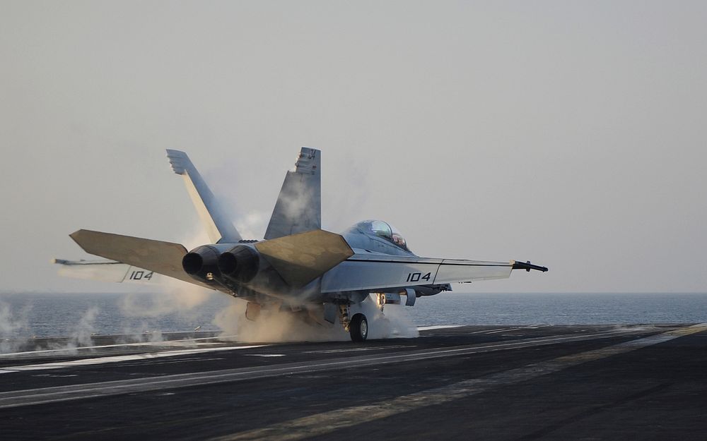 A U.S. Navy F/A-18F Super Hornet aircraft assigned to Strike Fighter Squadron (VFA) 2 launches from the flight deck of the…