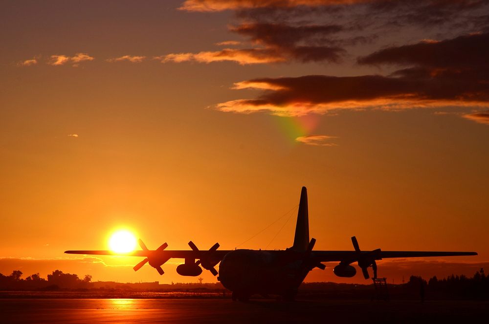 A Moroccan C-130 aircraft awaits its next mission during Exercise African Lion 2012 as the sun sets at the Inezgane…