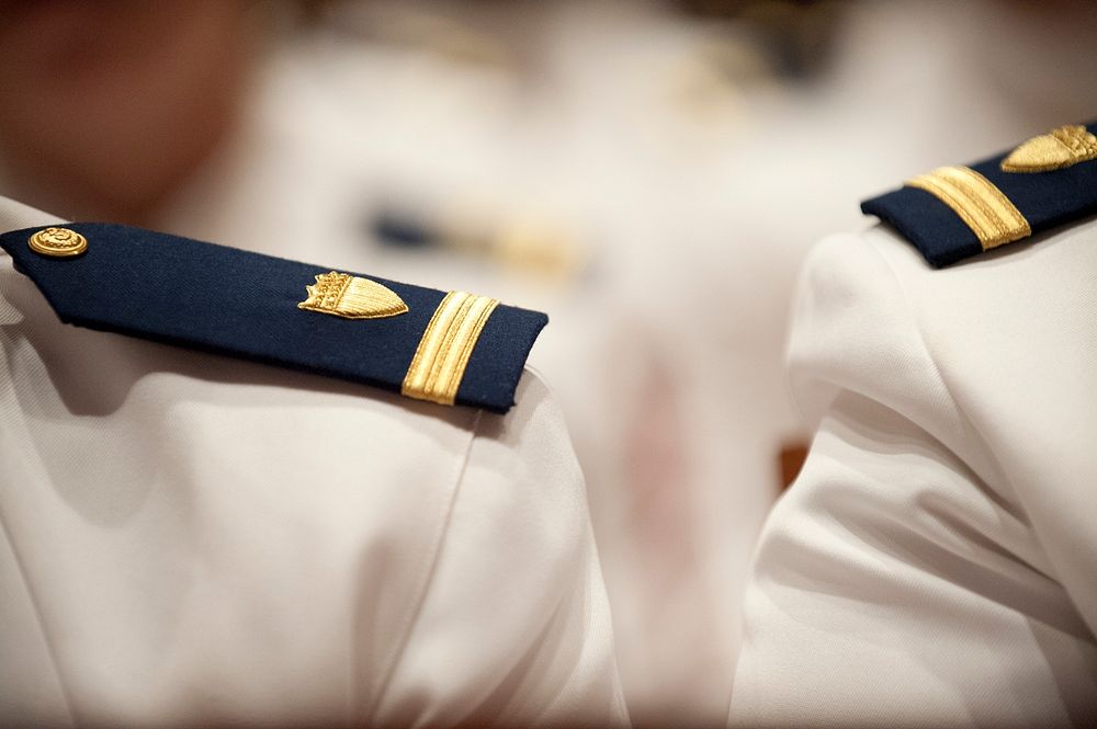 Officer candidates are advanced to the rank of ensign during a graduation ceremony Wednesday, May 2, 2012, at the U.S. Coast…