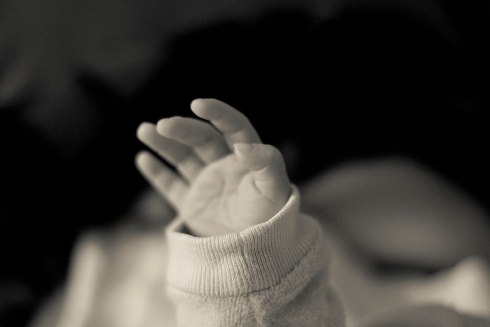 Tiny baby hand. Free public domain CC0 photo.