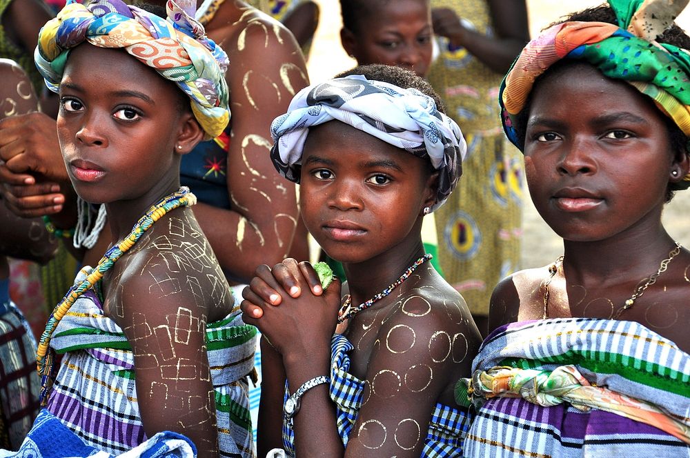 Ghana young women. Young women in ceremonial dress at a community health event sponsored by USAID. (USAID/Kasia McCormick)…