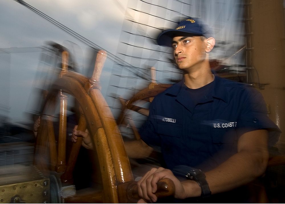 CGC Eagle summer training cruiseCoast Guard Academy 4th Class Cadet Kent Altobelli mans the helm of the Coast Guard Cutter…