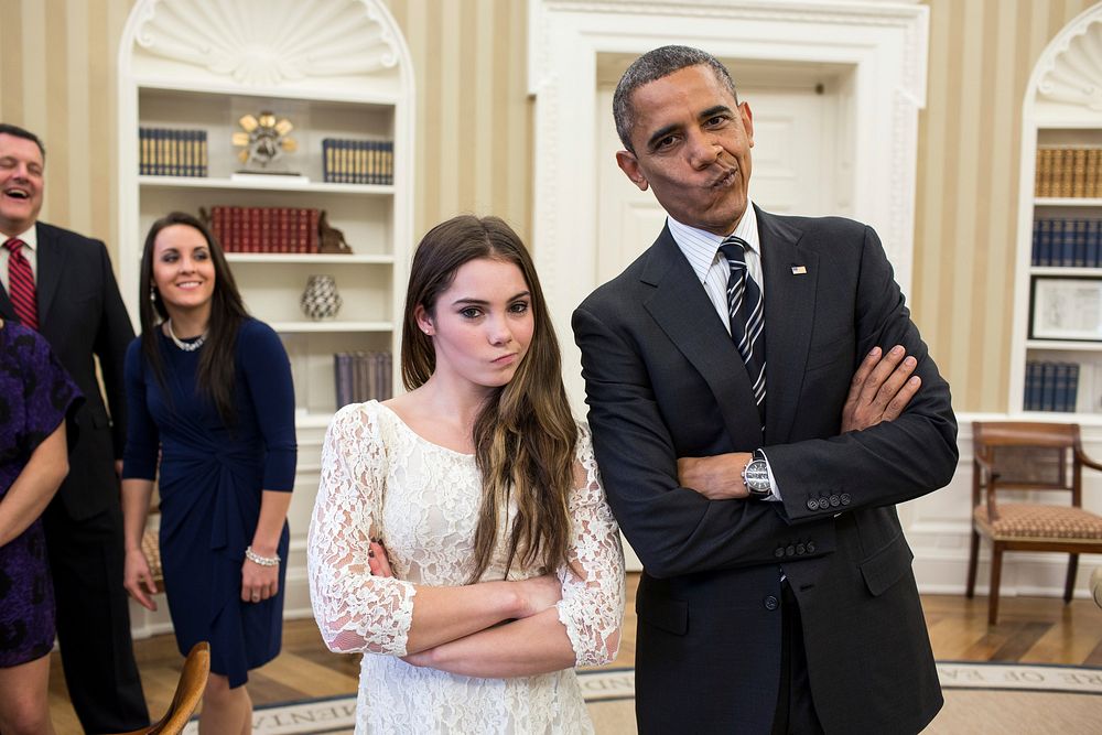 President Barack Obama jokingly mimics U.S. Olympic gymnast McKayla Maroney's "not impressed" look while greeting members of…