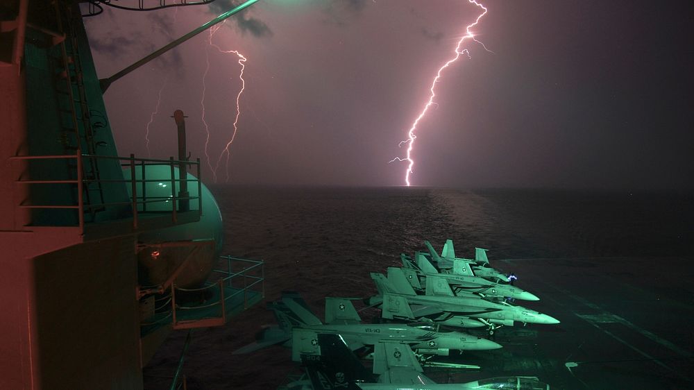 The aircraft carrier USS Dwight D. Eisenhower (CVN 69) operates near a storm in the Arabian Sea Nov. 19, 2012.