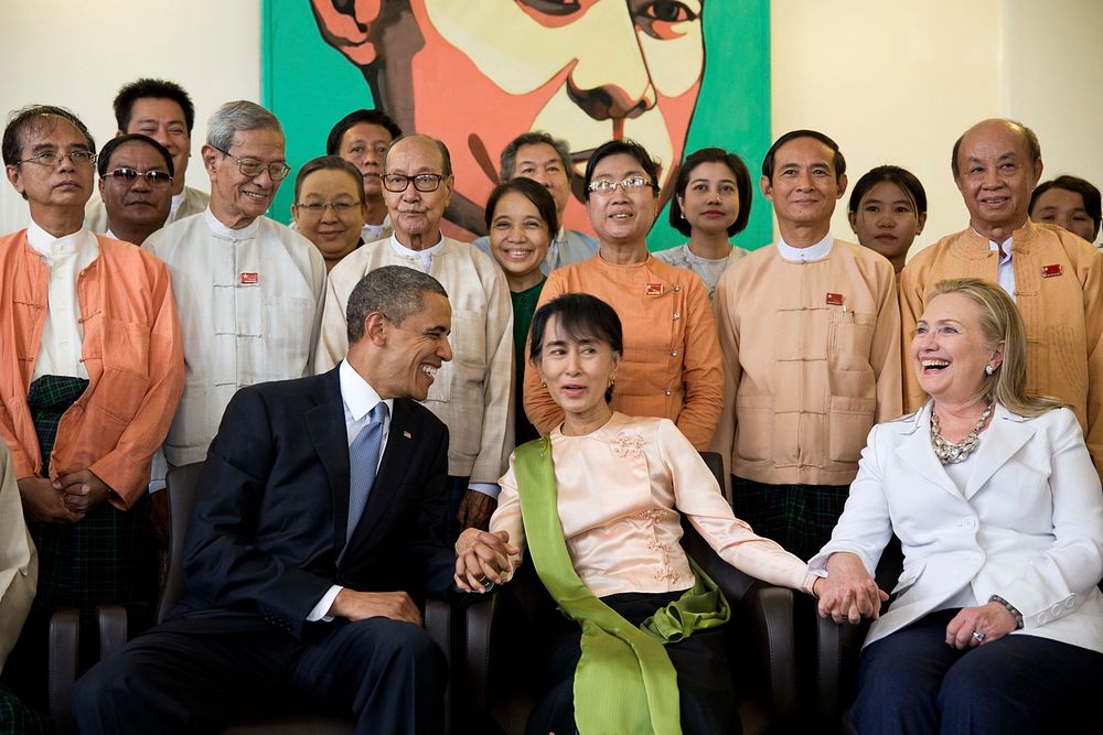 President Barack Obama and Secretary of State Hillary Rodham Clinton are photographed with Aung San Suu Kyi and her staff at…