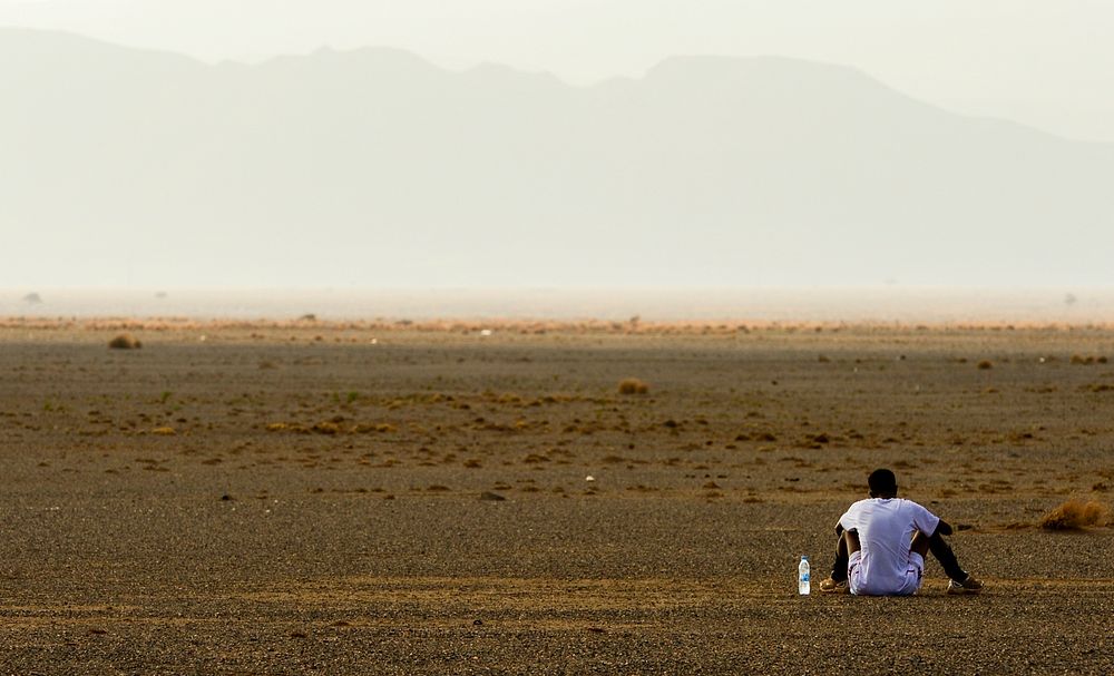A Djiboutian runner rests after completing the Grand Bara 15K in Djibouti Dec. 20, 2012. More than 1,800 U.S. Service…