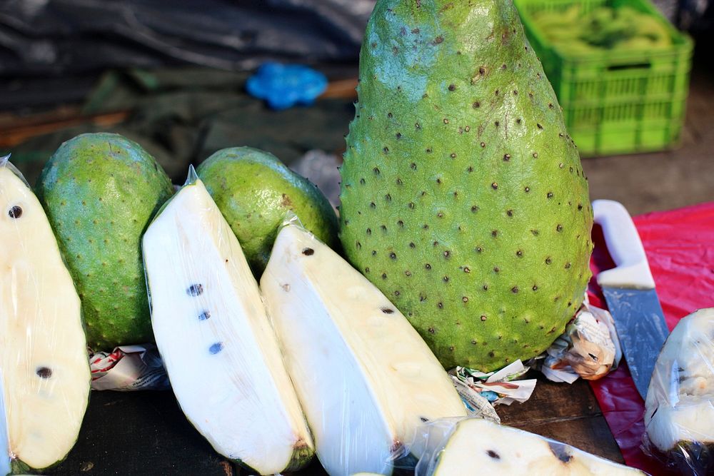 Alajuela's public market. Fruit. Pieces of soursop (la guan&aacute;bana). Alajuela, Costa Rica.