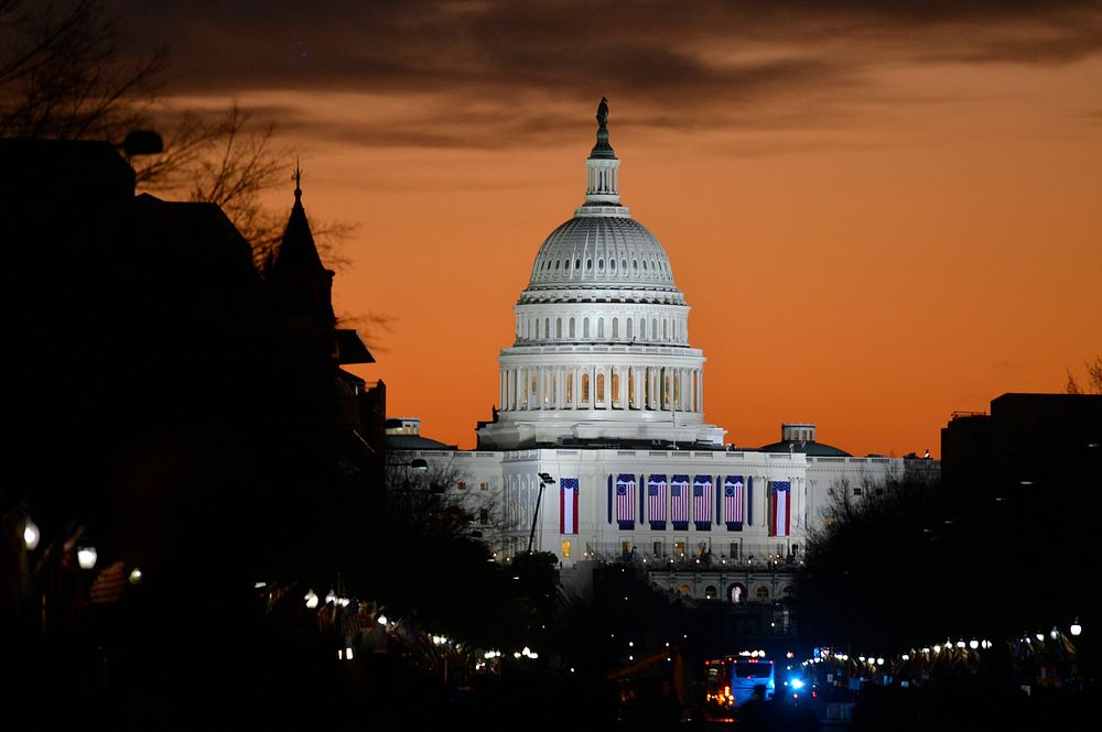 The sun rises over the U.S. Capitol before the public swearing-in ceremony during the 57th Presidential Inauguration in…