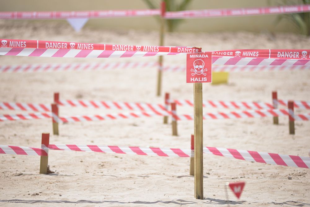 A section of ground is cordoned off during a demonstration held by the United Nations Mine Action Service (UNMAS) in…