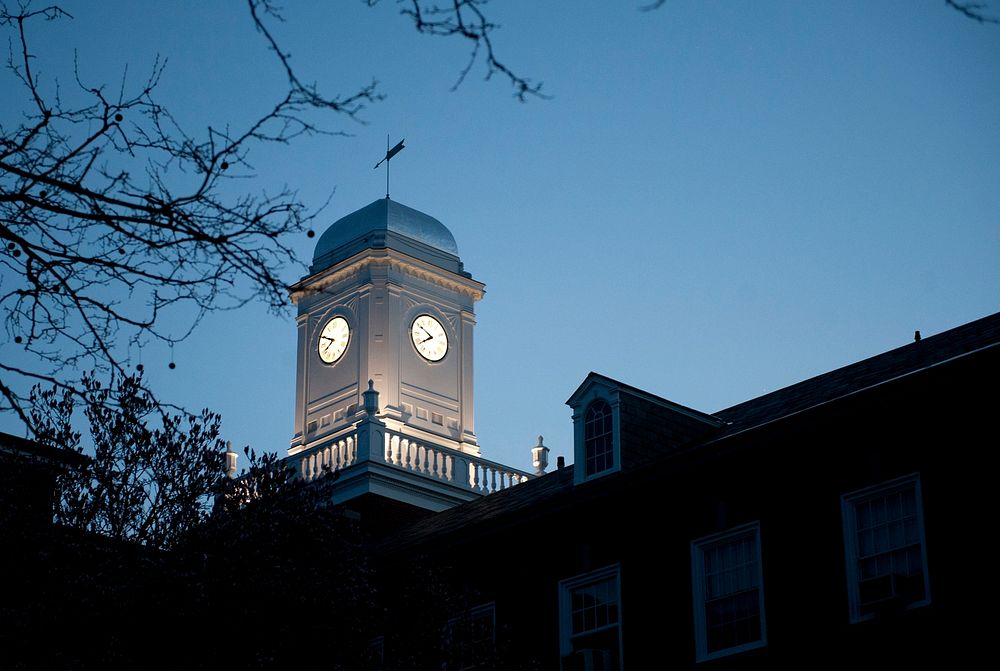 130415-081 Take Back the NightNEW LONDON, Conn. -- Hamilton Hall's clock tower is illuminated April 15, 2013 as U.S. Coast…