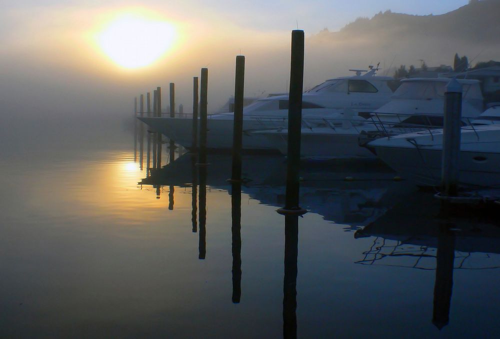 Boats in the fog. Original public domain image from Flickr