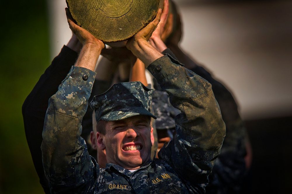 U.S. Naval Academy midshipmen with the Class of 2016 conduct a log carrying exercise as part of the U.S. Naval Academy Sea…