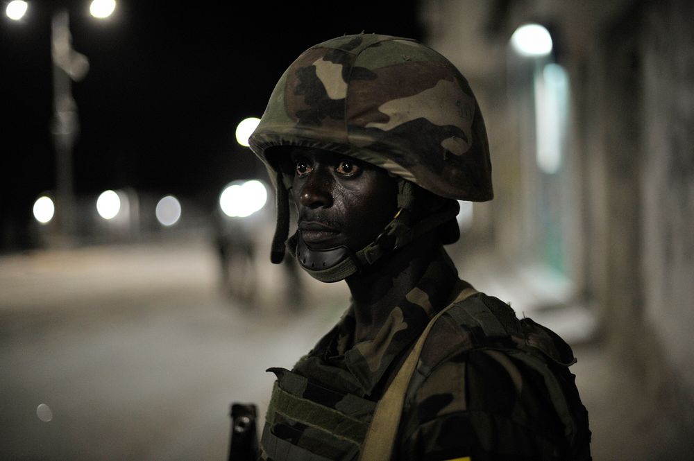 A member of the African Union Mission in Somalia patrols along a street during an operation aimed at improving security in…
