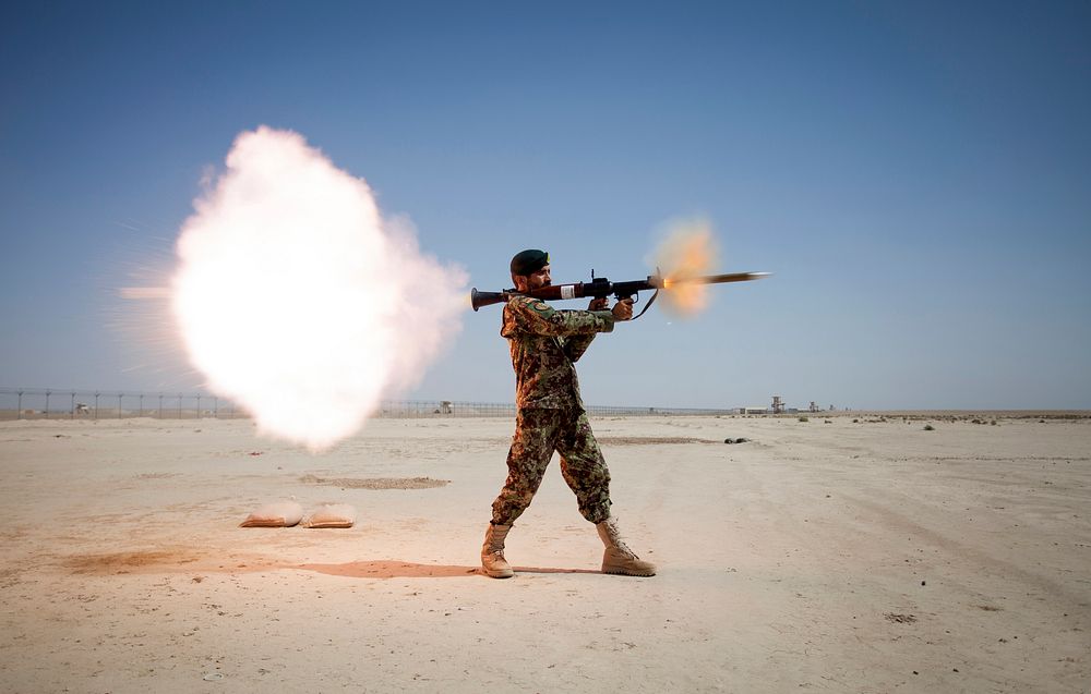 An Afghan National Army (ANA) soldier assigned to the Mobile Strike Force Kandak fires a RPG-7 rocket-propelled grenade…