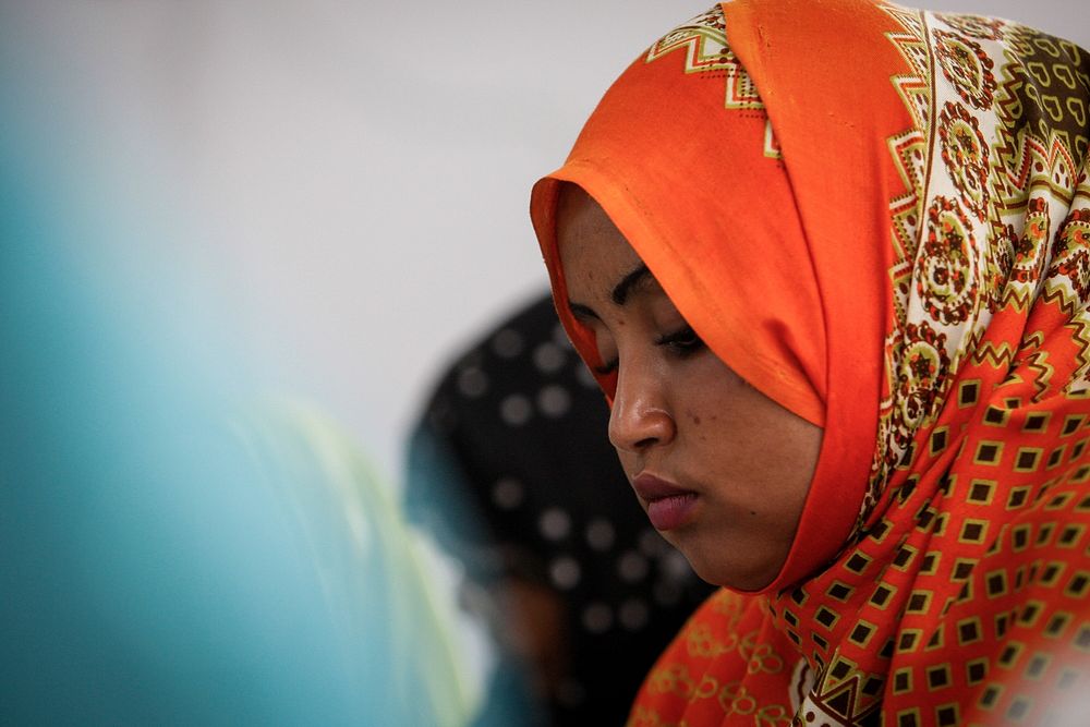 A woman listens during a meeting with United Nations Special Representative of the Secretary-General for Somalia (SRSG)…