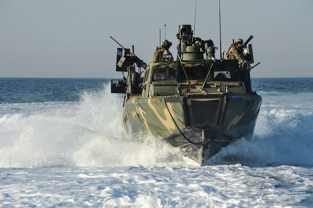 A U.S. Navy riverine command boat, assigned to Commander, Task Group 56.7.4, Coastal Riverine Squadron 4, conducts a patrol…
