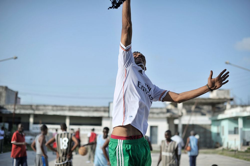 A basketball player in Mogadishu, Somalia, jump up to try and touch the rim during a practice session on June 6. Banned…