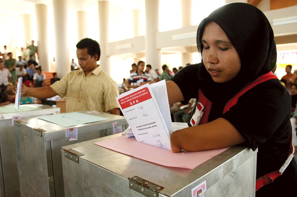 Disabled woman voting. USAID Democratic Governance Program