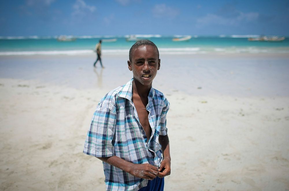A Somali boy is seen along the beach-front of Lido Beach in the Kaaraan district of the Somali capital Mogadishu, 05 August…
