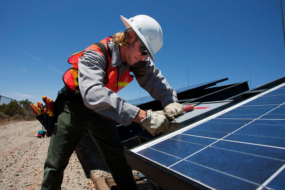 At work on the solar array. (NPS photo by Andrew Kuhn). Original public domain image from Flickr
