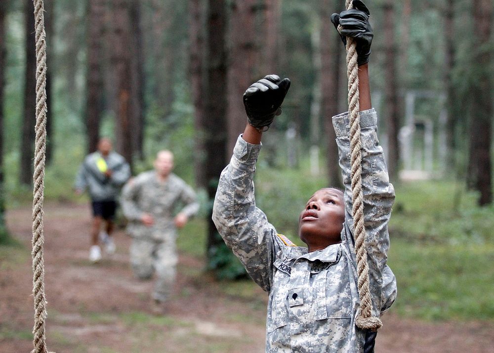 ClimbingGRAFENWOEHR, Germany -- Spc. Ernestine Koroma from 30th Medical negotiates a portion of the obstacle course Aug. 20…