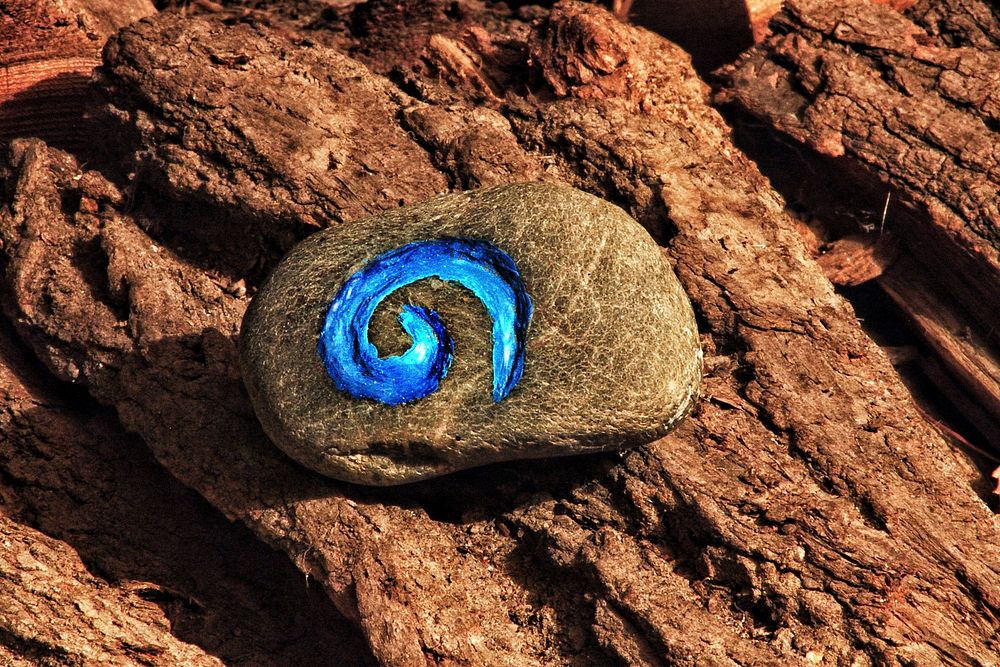 Painted stone on a rock. Free public domain CC0 photo