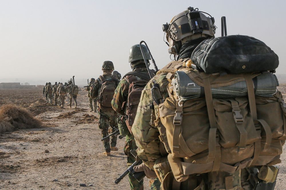 A U.S. Special Forces Soldier with Combined Joint Special Operations Task Force-Afghanistan and Afghan National Army…