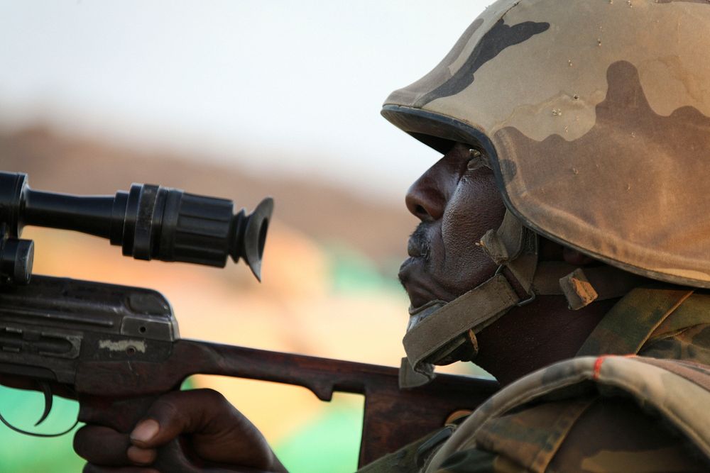 A Djiboutian soldier belonging to AMISOM guards the perimeter of a military camp on the hills surrounding the AMISOM…