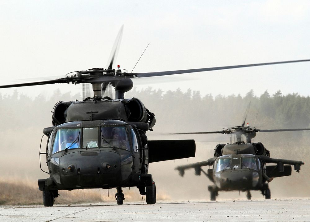 Two UH-60's prepare to load USAREUR Soldiers