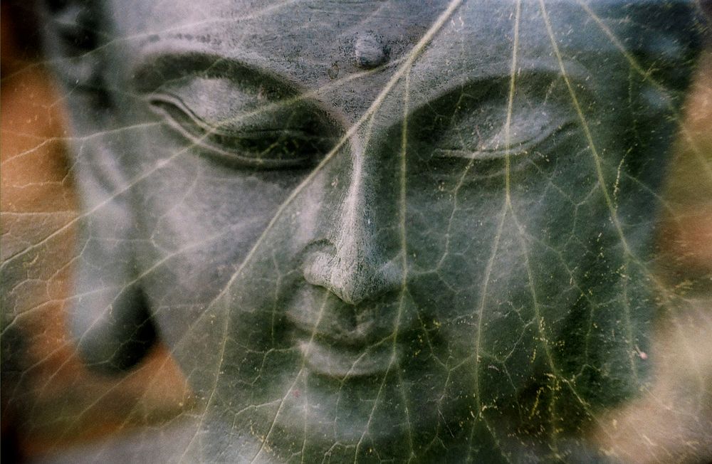 Buddha face statue. Free public domain CC0 image.