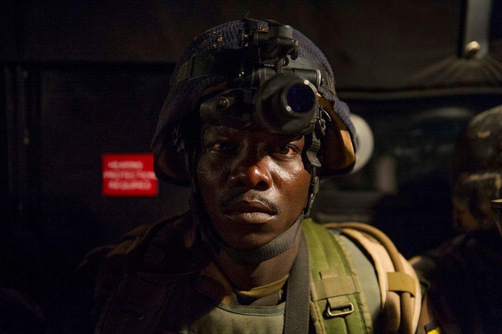 An AMISOM Soldier enroute to a cordon and search operation early in the morning on 16th April 2014 in Madina area of Wadajir…