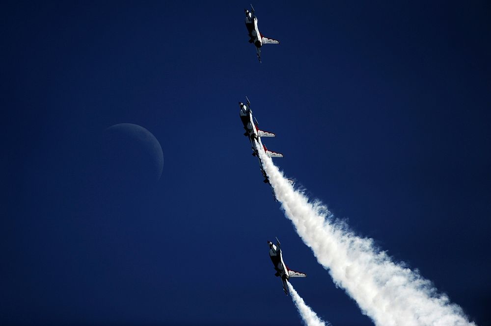 U.S. Air Force F-16 Fighting Falcon aircraft with the U.S. Air Force Air Demonstration Squadron, the Thunderbirds, perform…